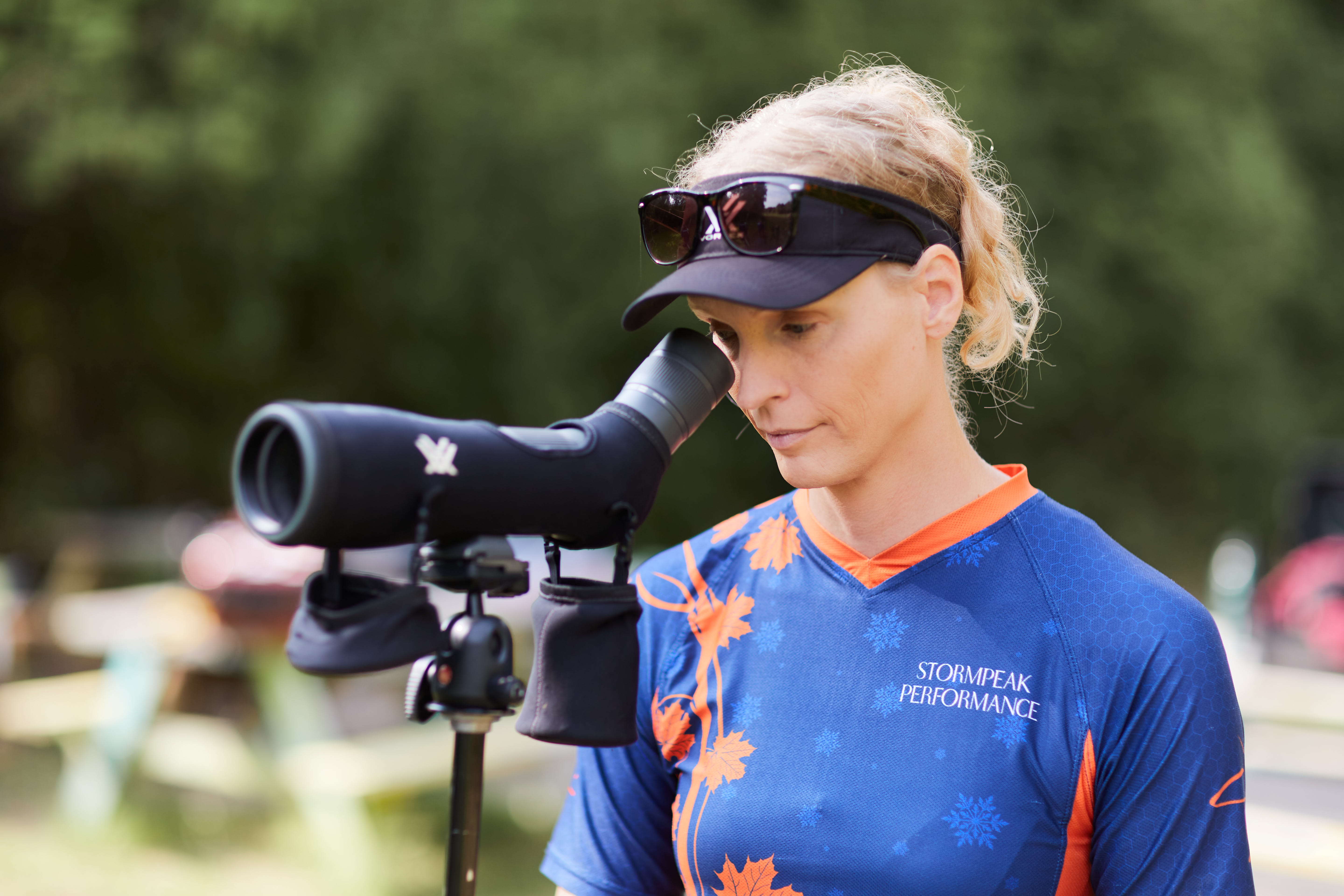 Stephanie looking through the scope